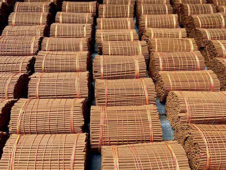 Tibetan herbal incense rolled up and drying in the sun at Kunga's Uncle's Factory