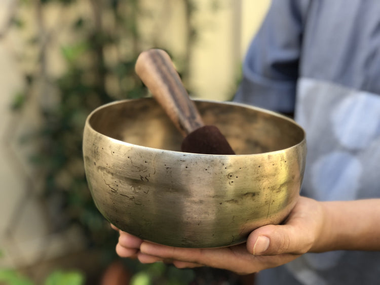 Tara singing bowl held in hand