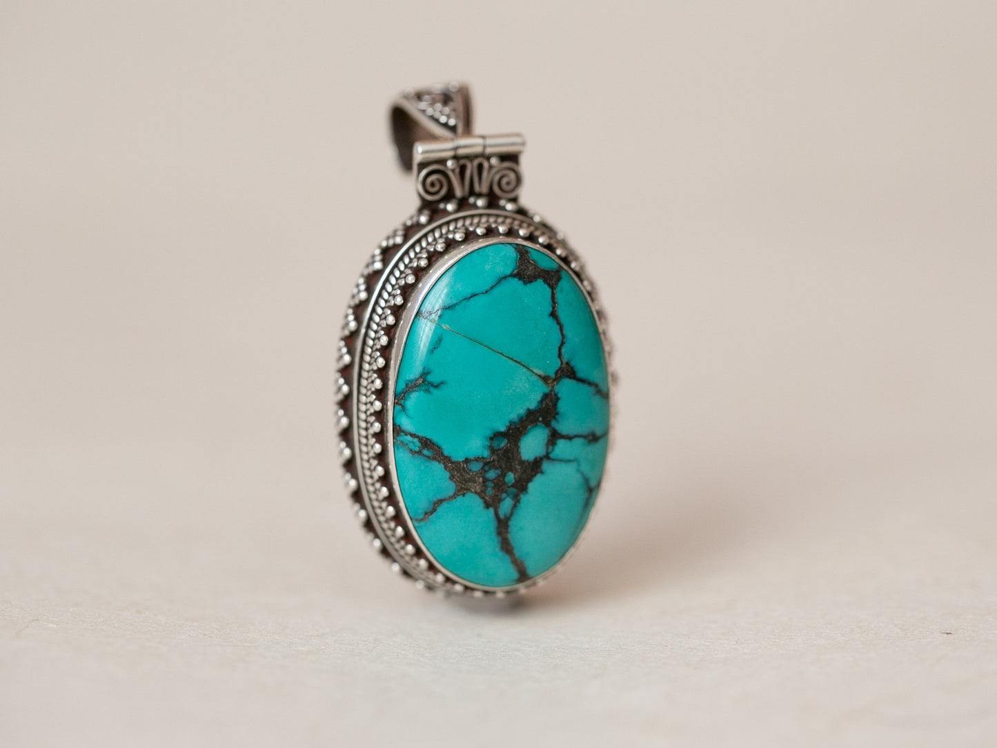 Oval Tibetan Turquoise and Silver Pendant