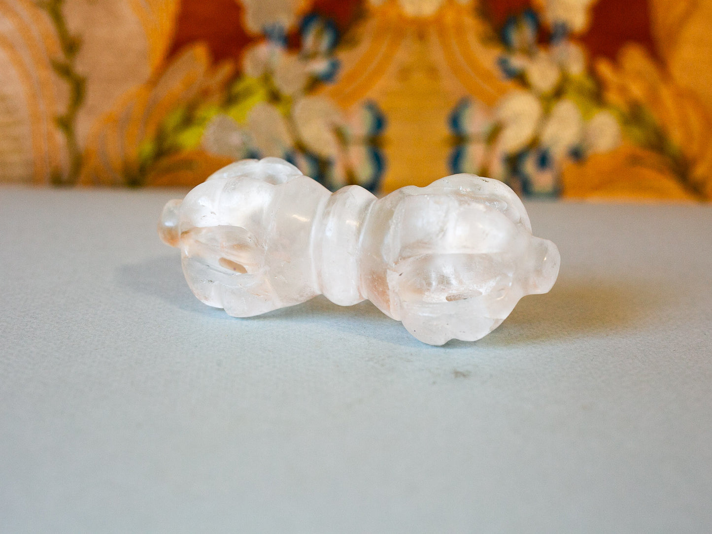Quartz crystal vajra viewed from front and side.