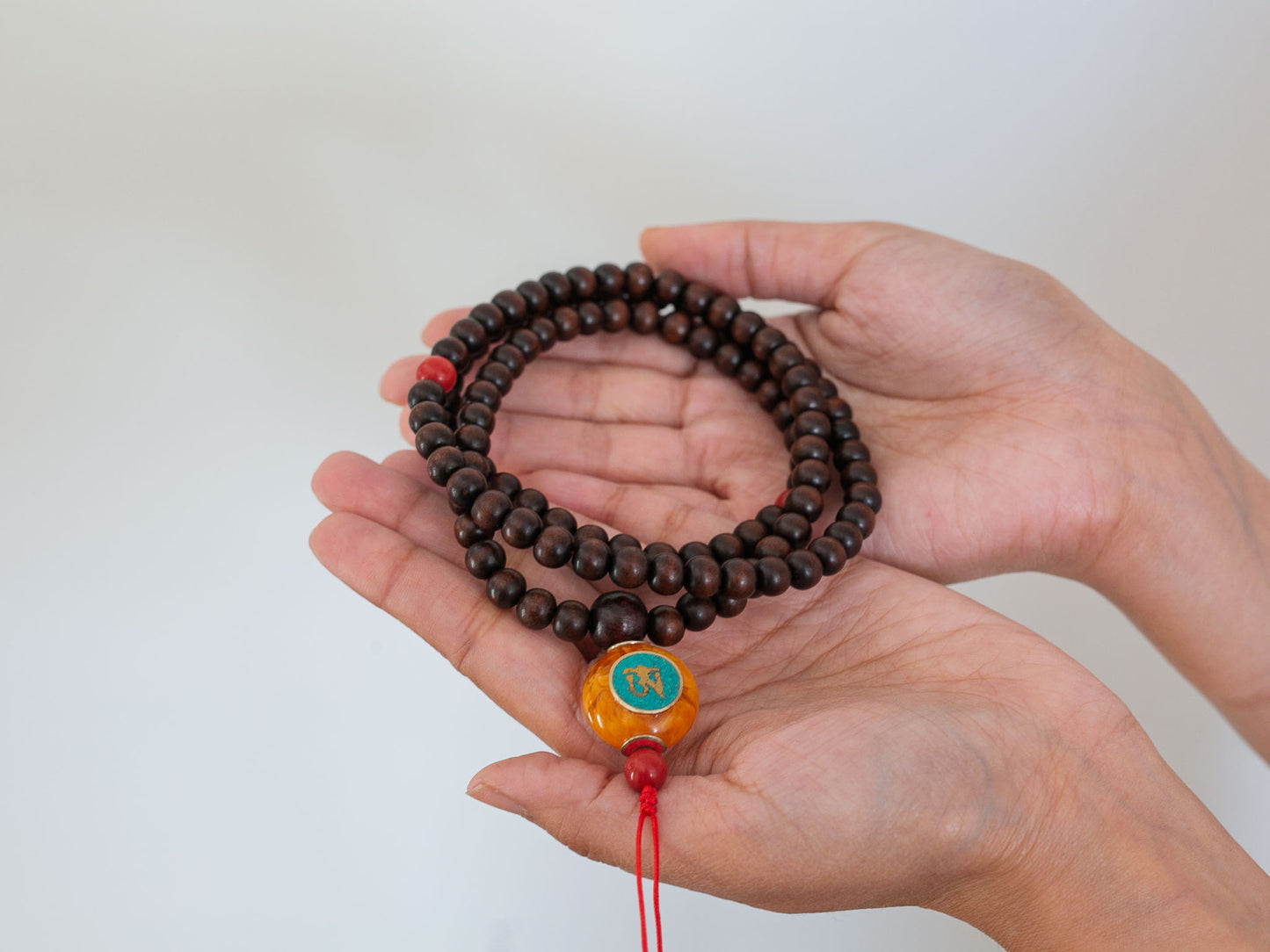 Custom Rosewood Mala with Compassion Eyes Pendant
