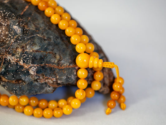 Amber mala in yellow