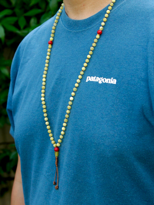 mala worn around neck