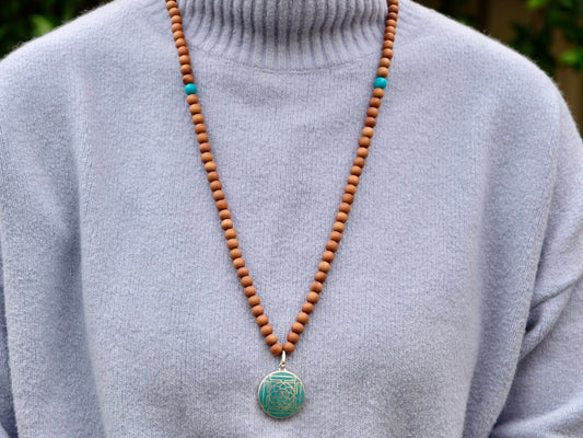 Sandalwood Mala with Turquoise and Mandala Charm