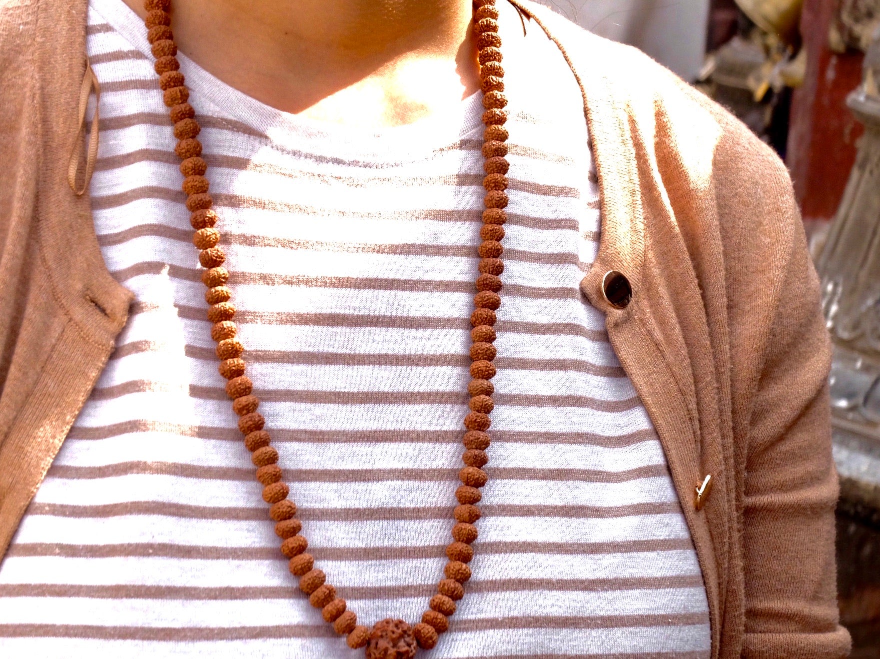 Rudrkasha mala with 8 face worn around neck