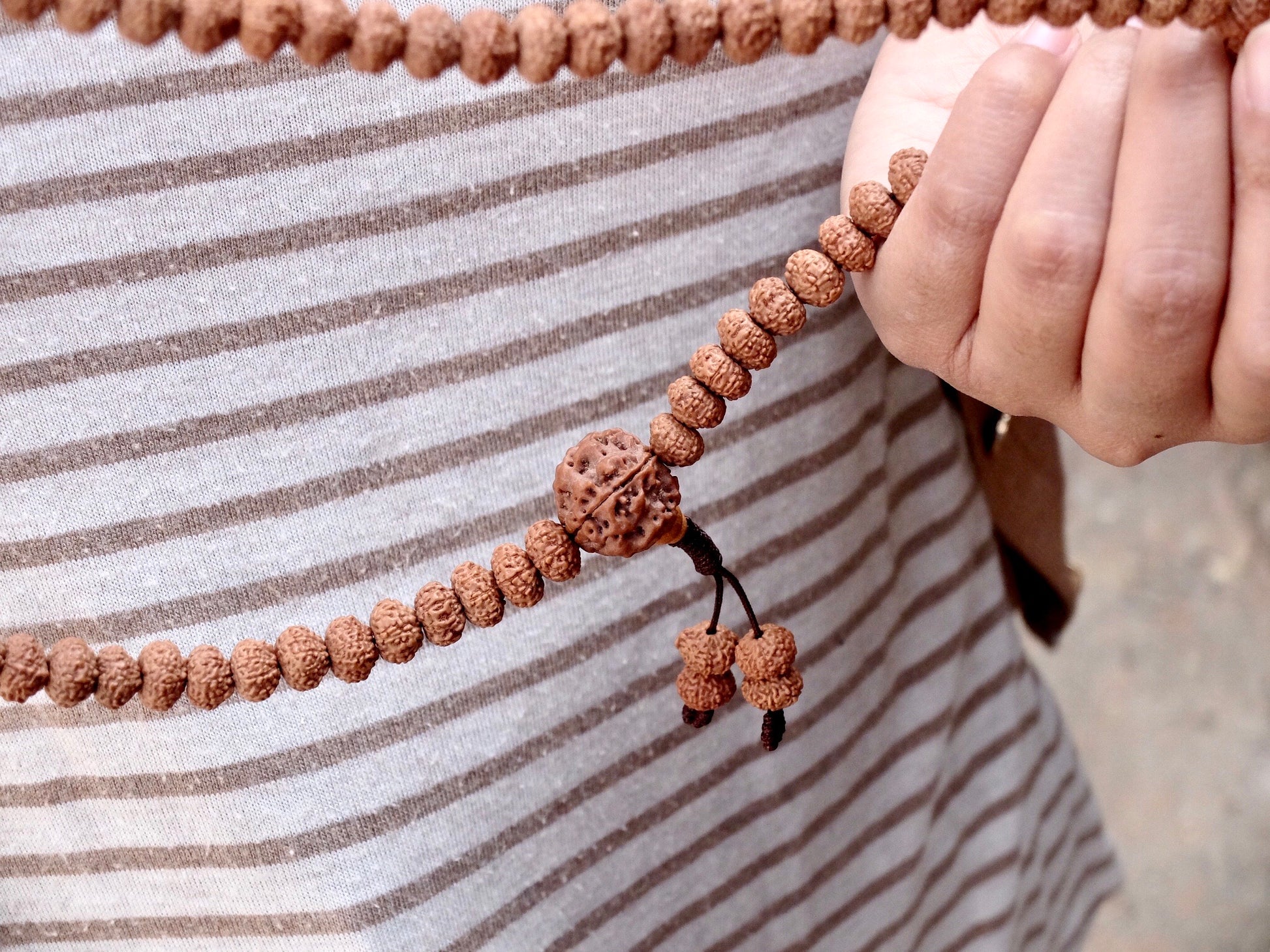 Rudraksha mala close up with Guru bead