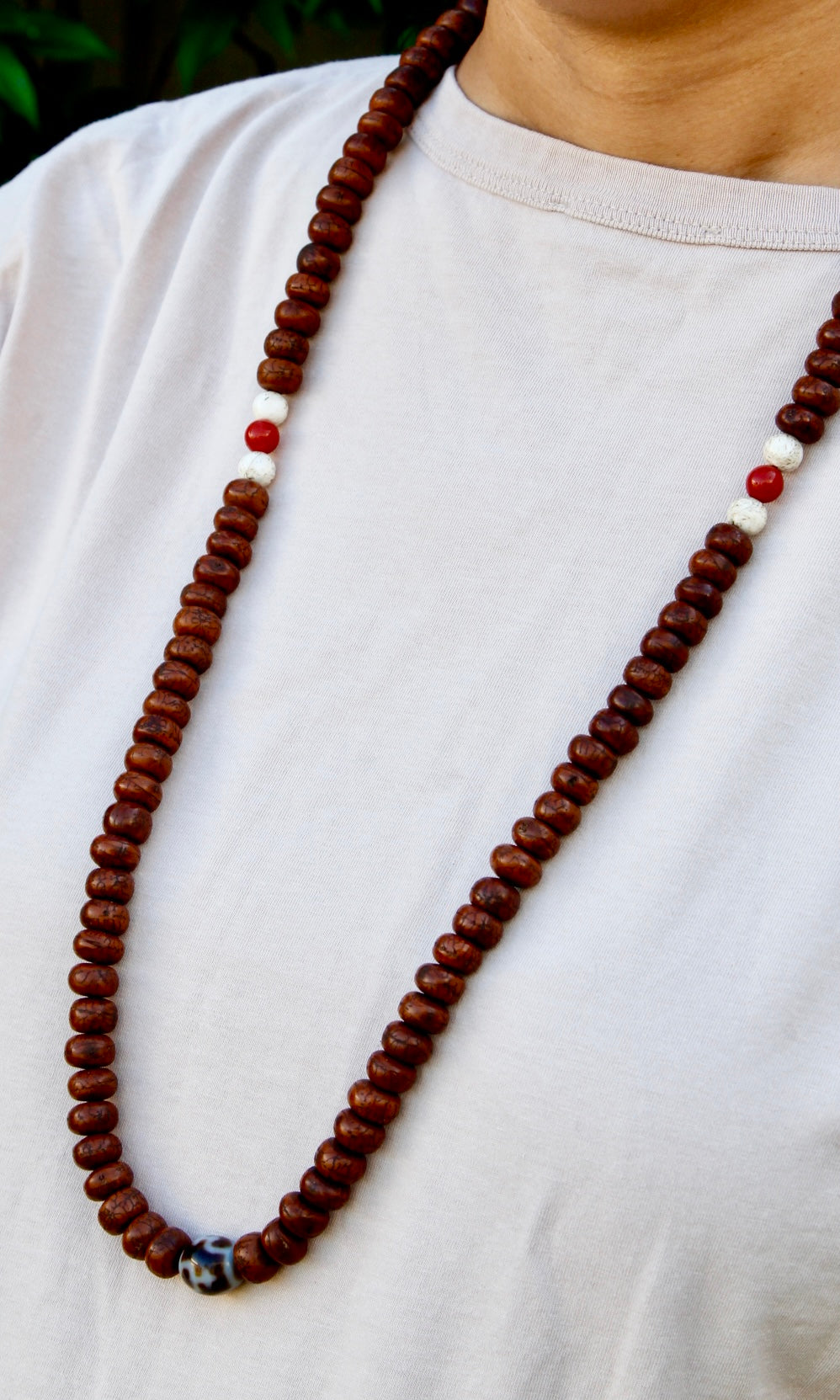 Bodhi seed mala viewed from side in portrait mode