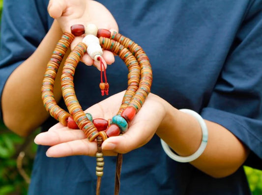 Why are bones used in Mala Beads?