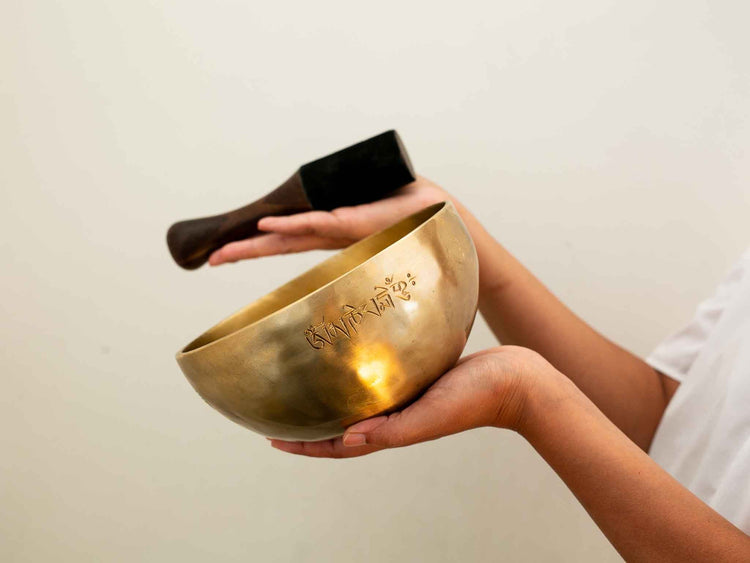 Singing bowl held in hand