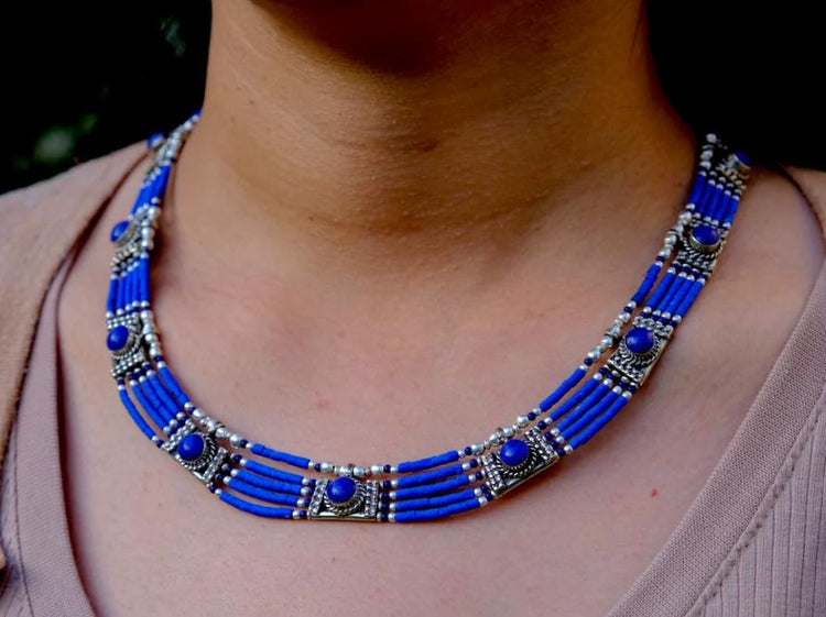 Photo of Tibetan lapis lazuli necklace around neck which is on sale