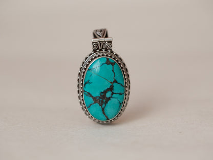 Oval Tibetan Turquoise and Silver Pendant