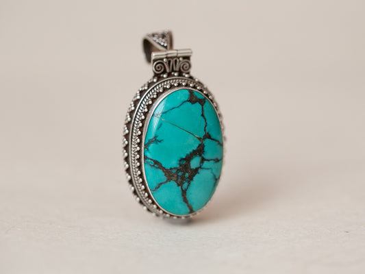 Oval Tibetan Turquoise and Silver Pendant