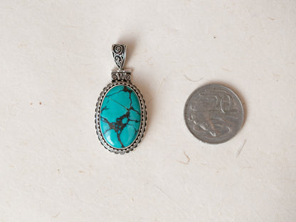 Oval Tibetan Turquoise and Silver Pendant