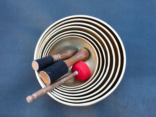 Set of 7 Nesting Hand Hammered Tibetan Singing Bowls