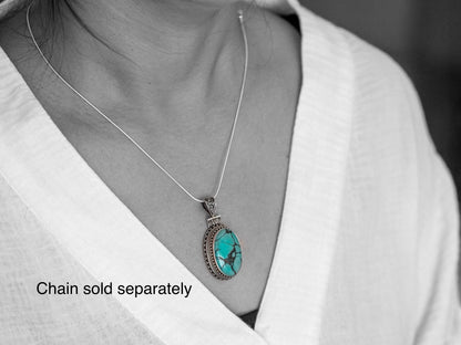 Oval Tibetan Turquoise and Silver Pendant
