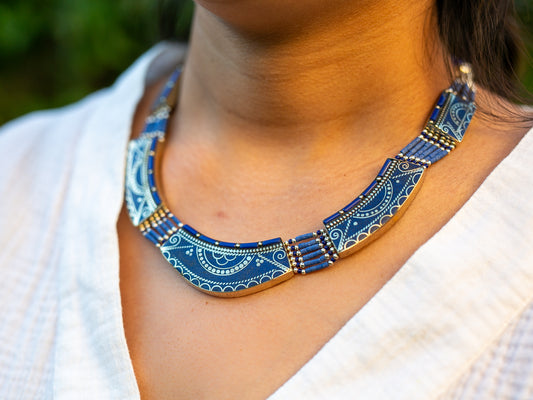 Tibetan lapis necklace worn around woman's neck