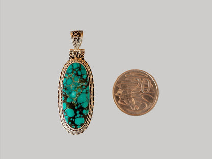 Long Turquoise Silver Pendant