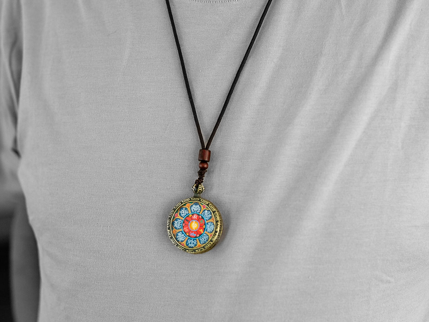 Om and Auspicious Symbols Thangka Pendant