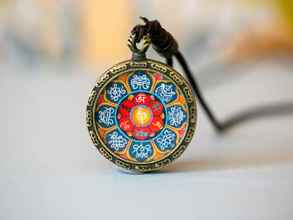 Om and Auspicious Symbols Thangka Pendant