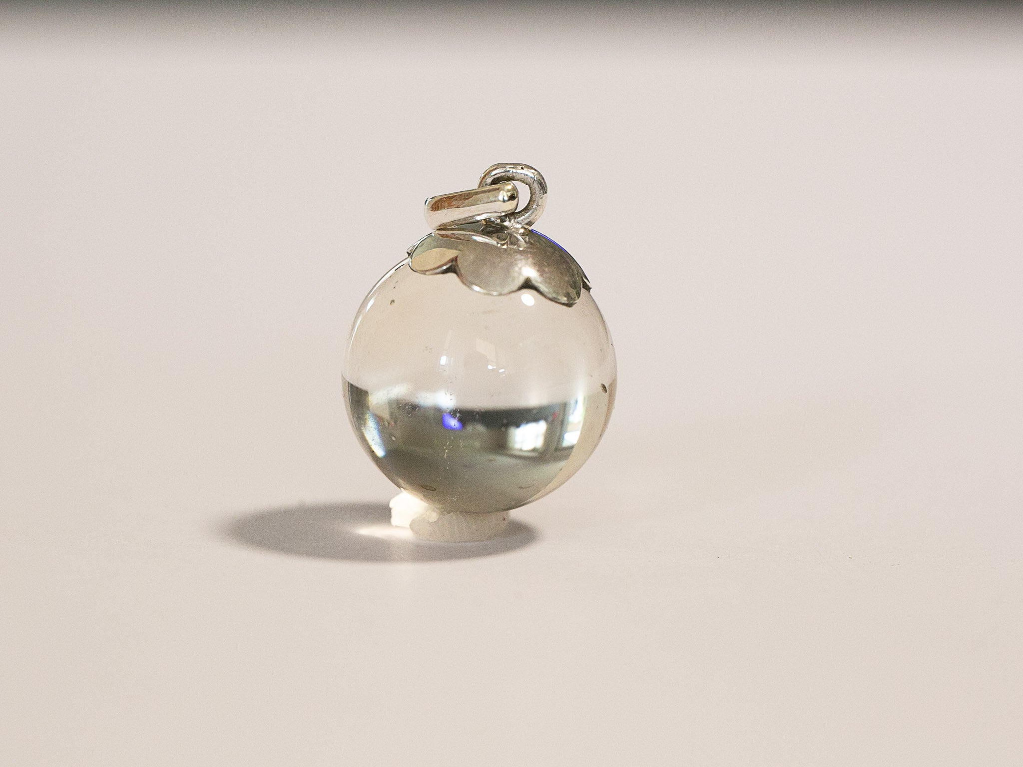 Crystal store ball pendant