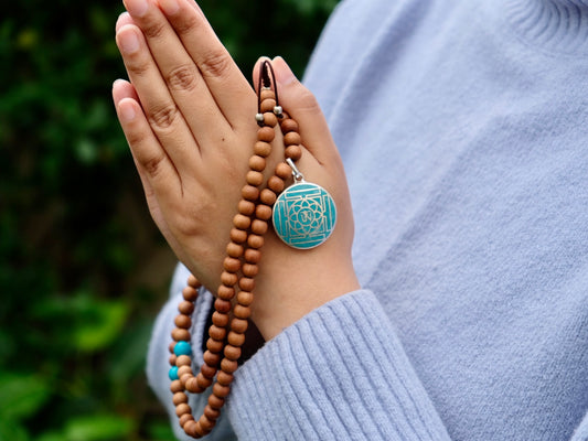 Sandalwood Mala with Turquoise and Mandala Charm