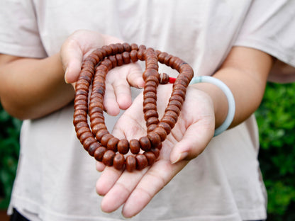 Short Bodhi Seed mala in hands