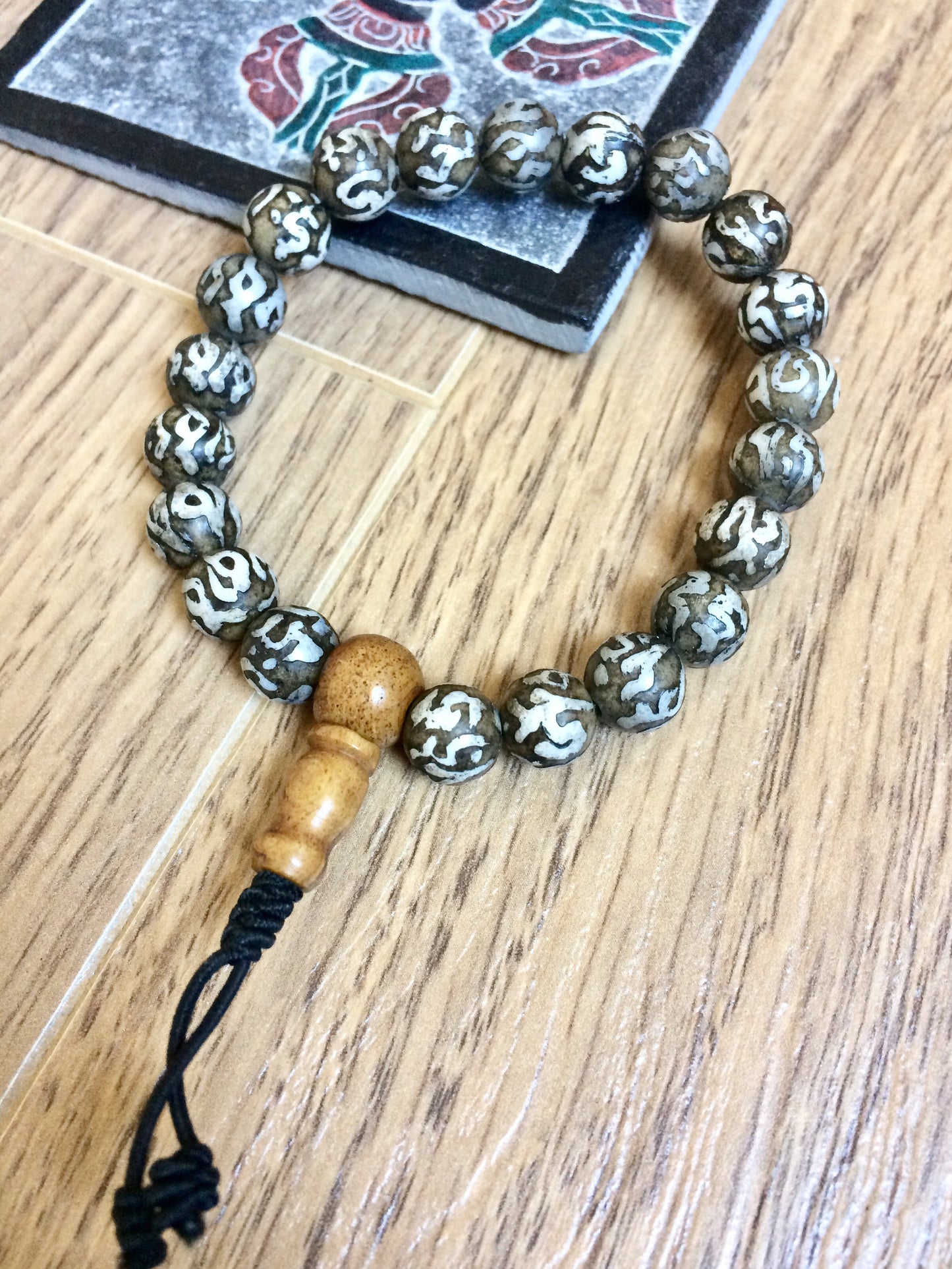 Om carved on Conch Mala Bracelet