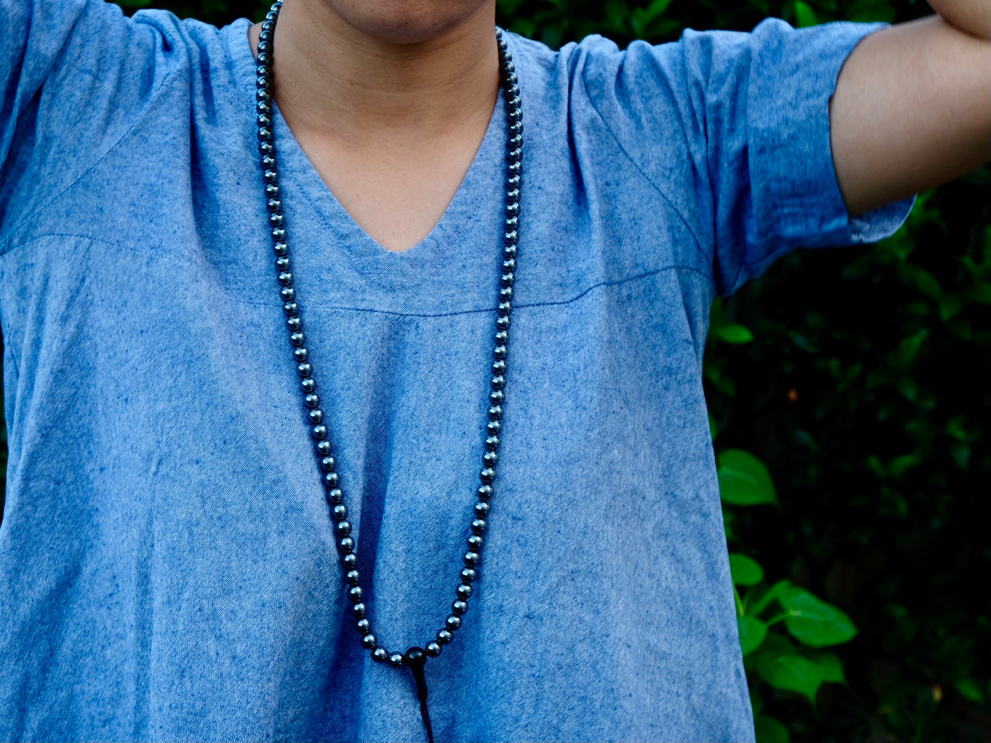 hematite mala worn around neck