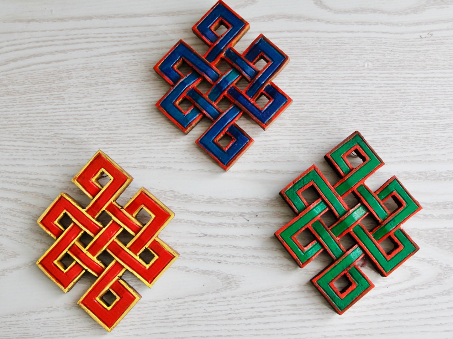 three colour choices for infinity knot wall hanging