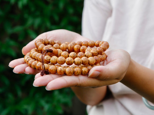 Bodh Gaya Mala in palm of hands