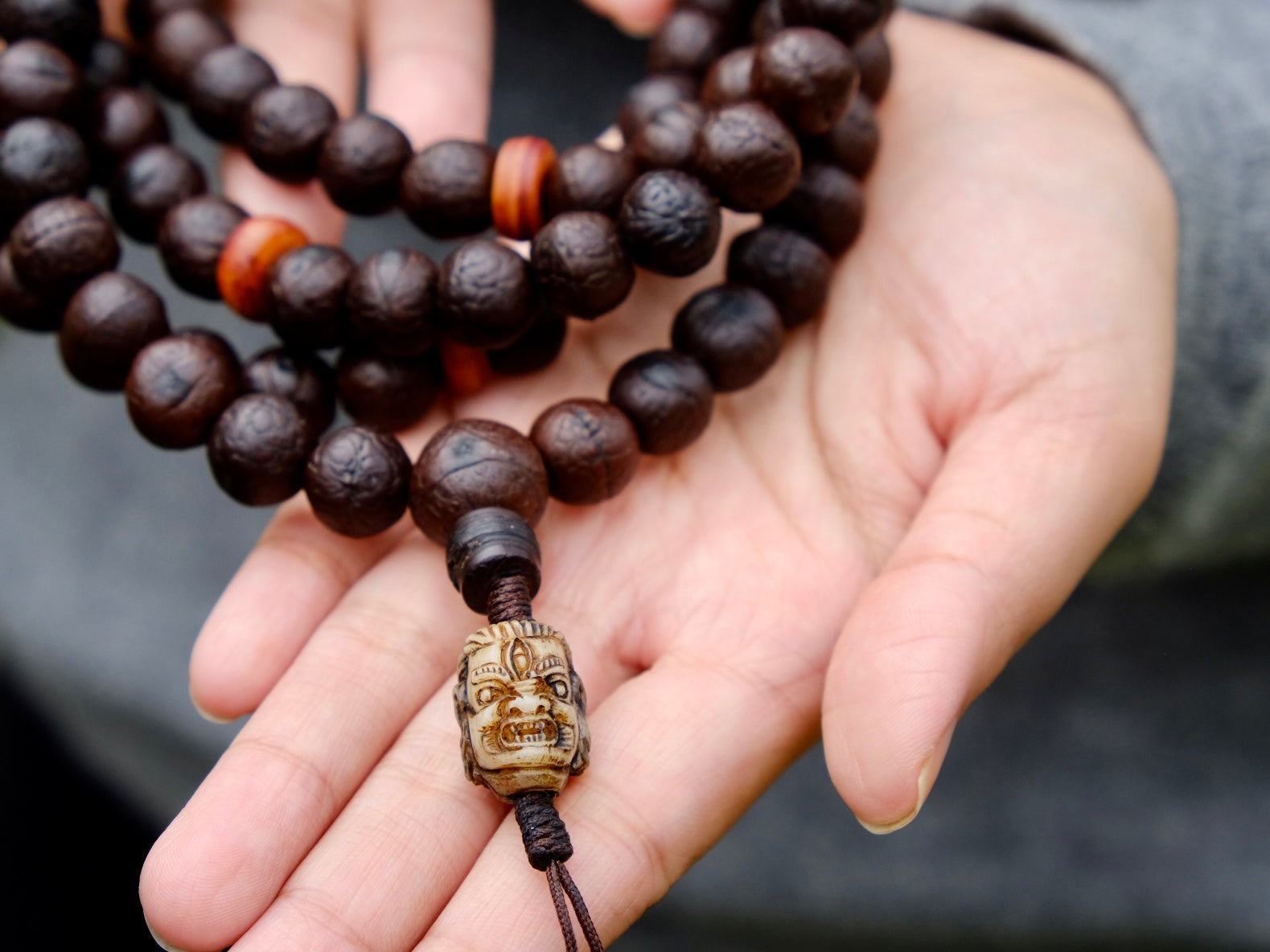 Close up of Mahakala guru bead in Bodhi Mala.